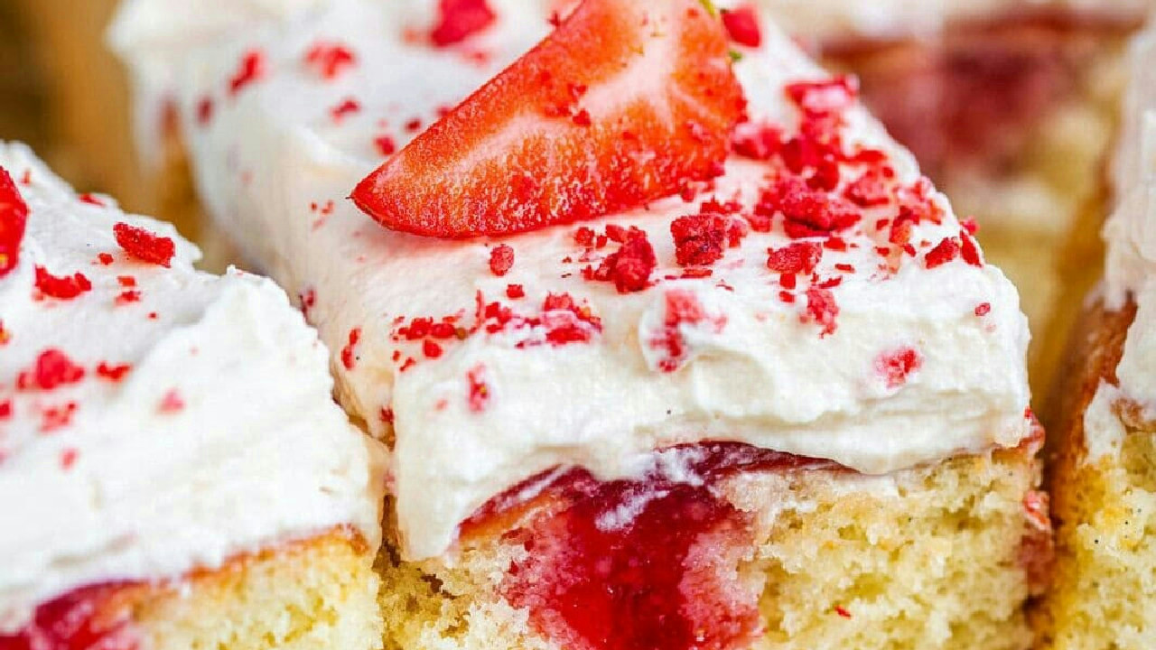 This Strawberry Poke Cake Is the Ultimate Summer Dessert This Strawberry Poke Cake Is the Ultimate Summer Dessert